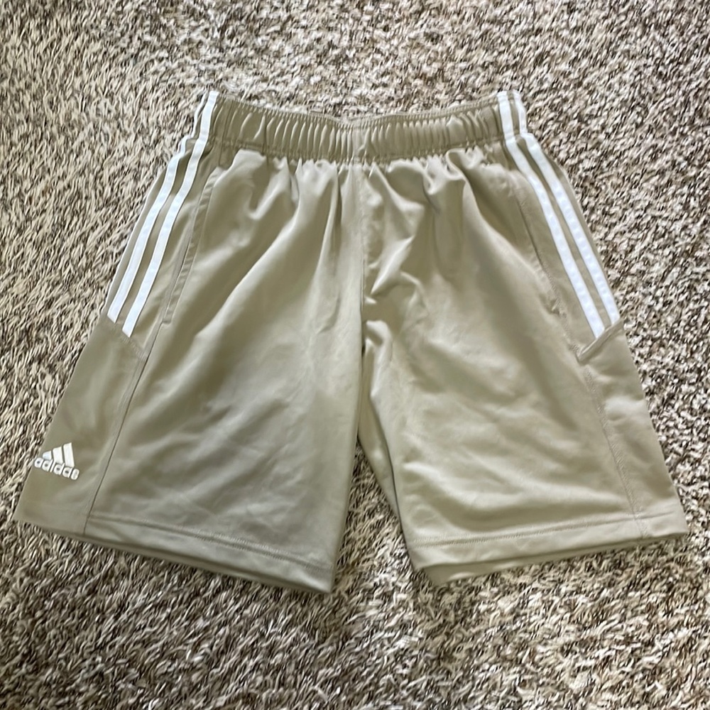Unisex adidas’s athletic shorts with pockets, never worn.